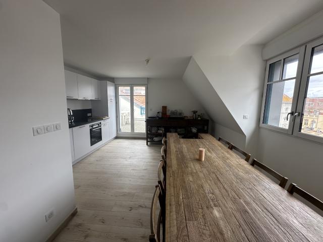 A saisir de suite superbe appartement de 112.94m2 en plein centre ville avec terrasse et parking