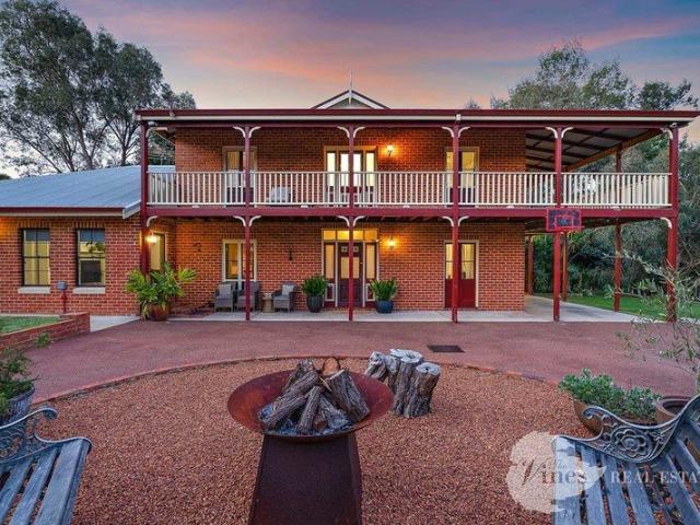 A Secluded Country Homestead & Rare Dual Living Acreage Haven