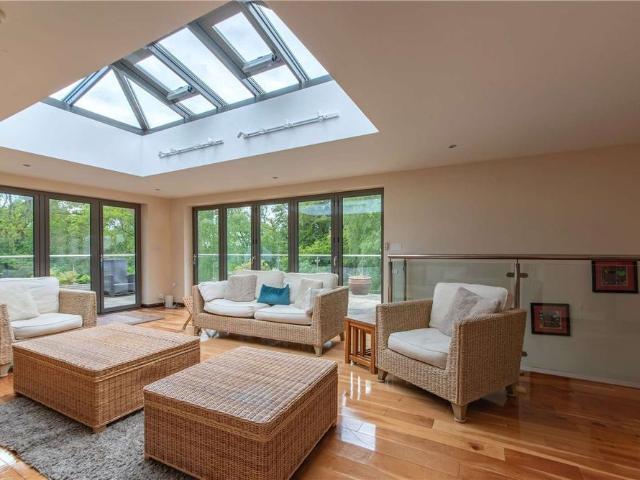 A secluded, energy efficient family home with exceptional entertaining space and beautiful grounds