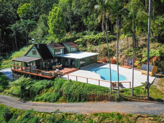 A Secluded Rainforest Sanctuary with Expansive Valley Views