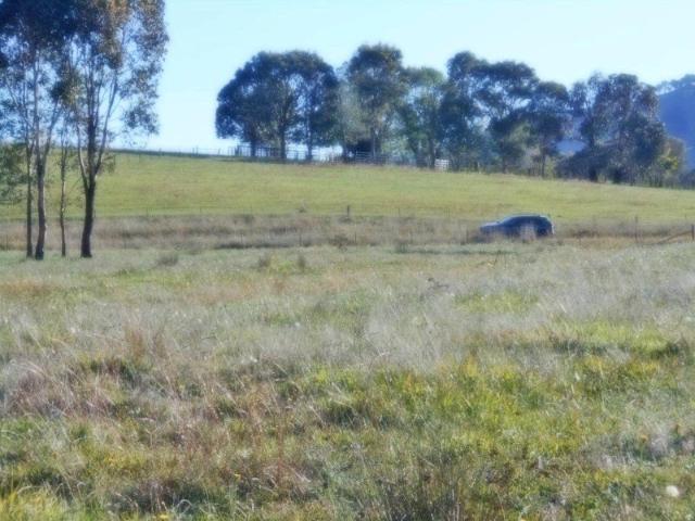 A Serene 5.6 Acre Parcel with APPROVED Country Home PLANS !
