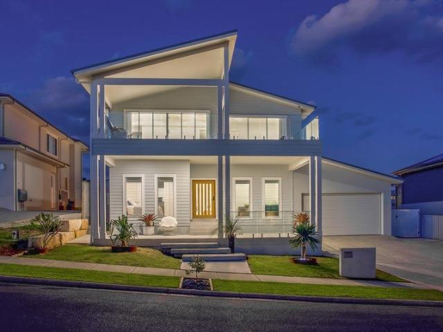 A Showpiece of Style, Space & Sweeping Ocean Views