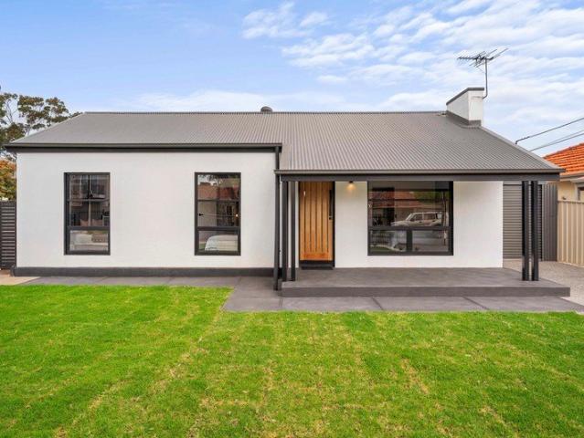 A single level home remodelled for more than one family across a prized, substantial parcel