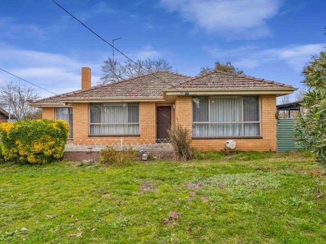 A Solid Brick Home with Plenty of Potential