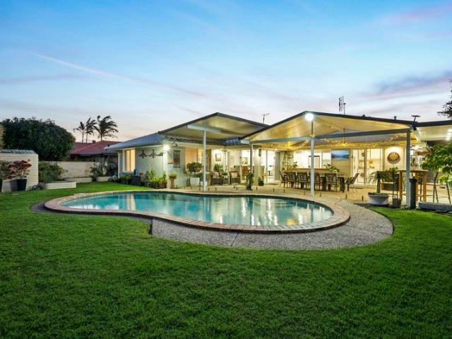 Owners are Downsizing Elegant North Facing Home sure to Impress!