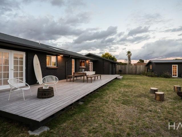 A Soulful Coastal Transformation With Studio, Expansive Sun Filled Deck and Direct Beach Access