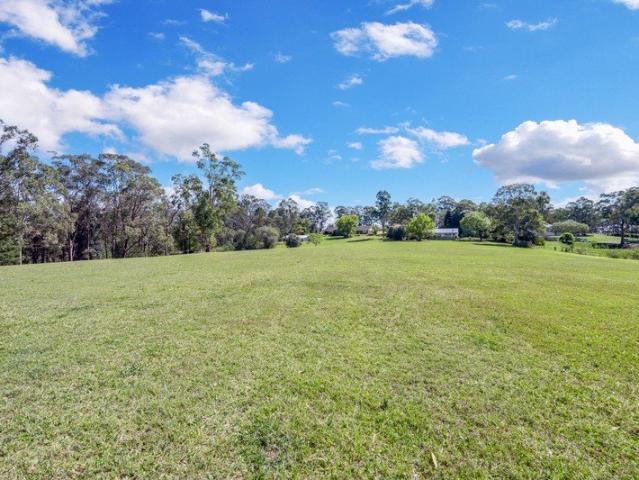 A Spacious Acreage Opportunity with Endless Potential