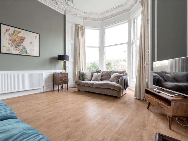 A spacious and bright furnished two bedroom conversation flat overlooking private residents' gardens in the West End