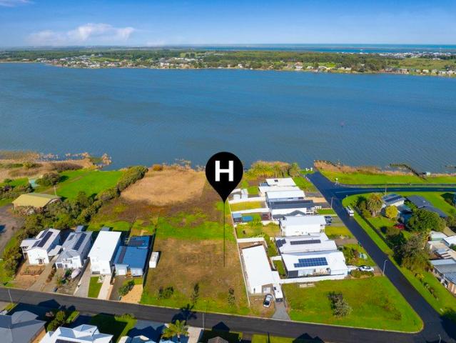 A Spacious Blank Canvas in a Peaceful Riverside Setting