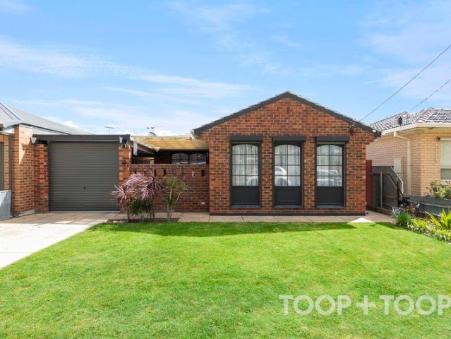A Spacious Entertainer with Modern Updates & Low Maintenance Living