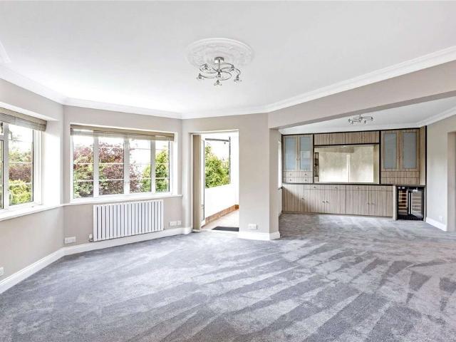 A spacious three bedroom apartment with a south facing balcony in a popular residential block