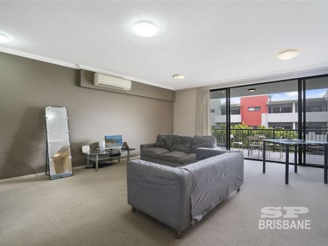 A spacious unit in a perfect location near Garden City shopping Center