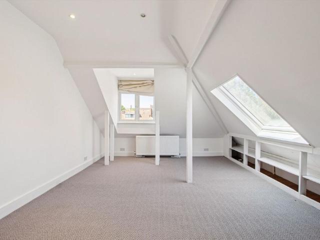 A spacious 3 bedroom flat spanning the top floor of an impressive semi detached Victorian house on one of the area's most desirable roads