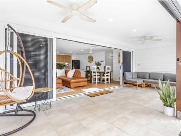 A special sanctuary with a heated pool, shed, a beautifully modern near new home and a gardener's paradise!