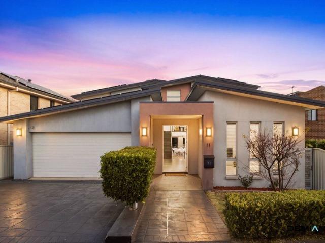 A special type of split level residence welcomes you home with undeniable presence. Designed with confidence. Destined to be your preference