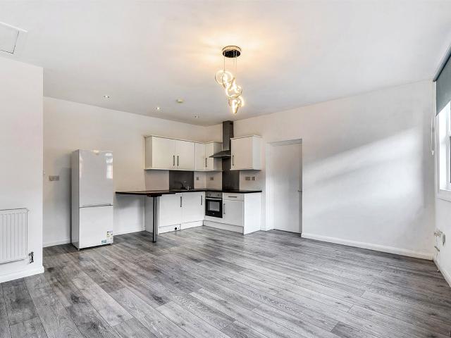 A two bedroom apartment with open plan living, two shower rooms and allocated parking, located in North Worcester. To Let £950pcm
