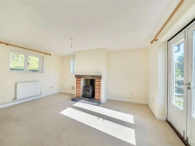 A two bedroom cottage with driveway and garage in Oare village. Oil Heating