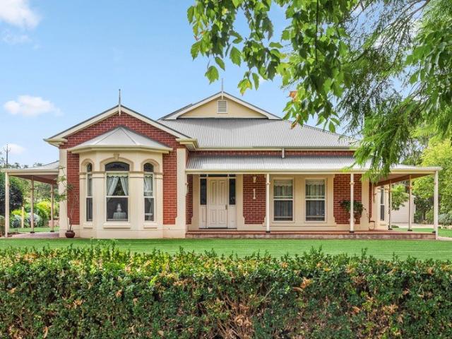 A Thoughtfully Crafted Home on Over an Acre of Possibility & Space