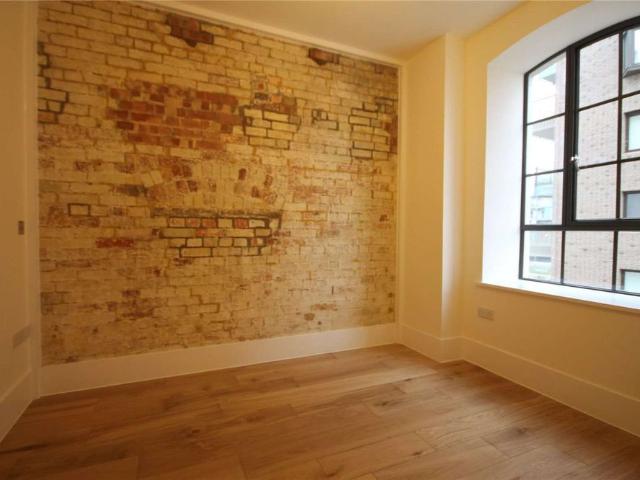 A three bedroom duplex apartment with original character features in the historic Spiller's Mill development