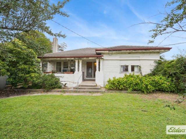 A Timeless Bungalow Offering Space, Charm and Scope to Transform