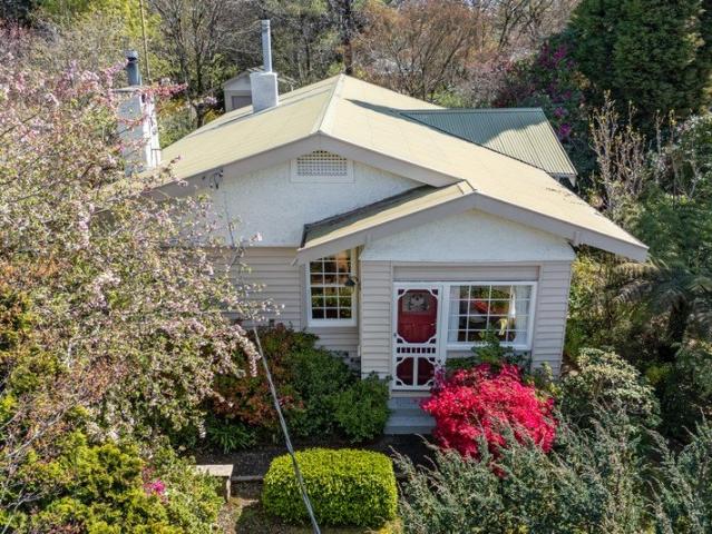 A Timeless Cottage Amongst the Gardens