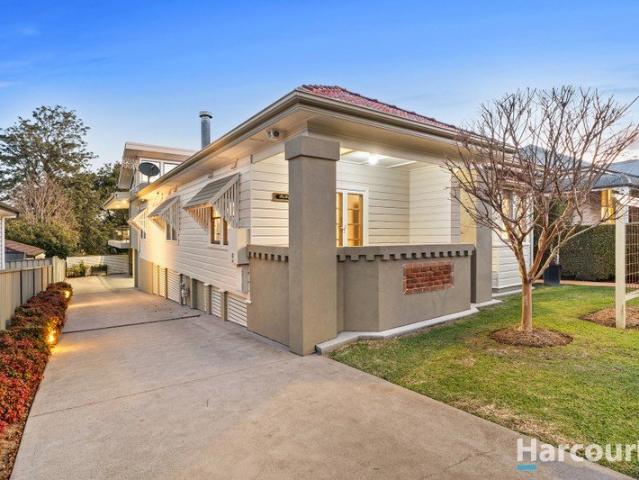 A timeless façade becomes a modern family masterpiece