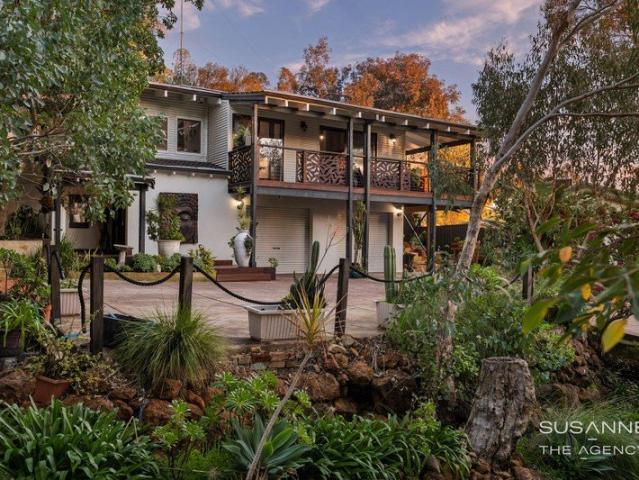 A Timeless Hills Retreat with Spectacular City Views
