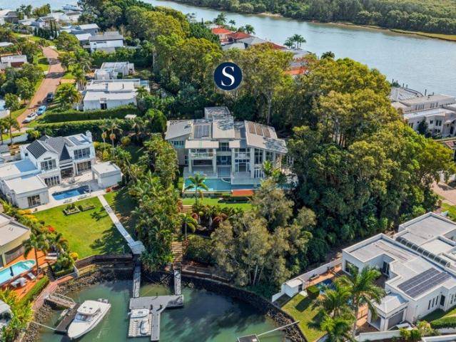 A Trophy Waterfront Residence of Scale, Privacy & Prestige