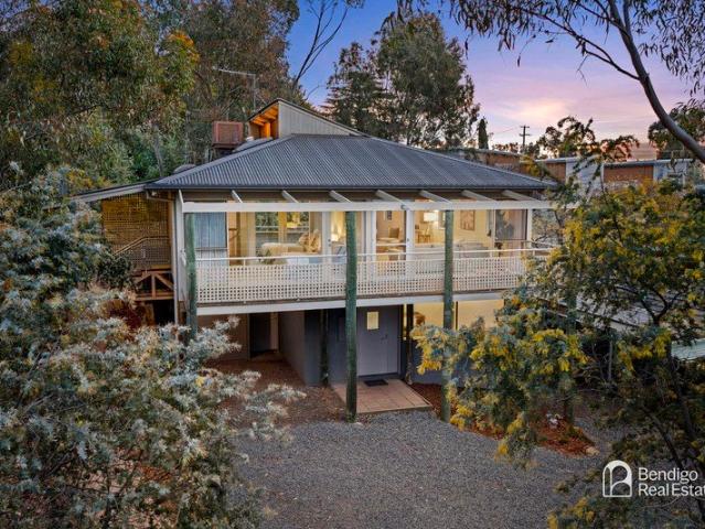 A Unique Architectural Home, Surrounded by Trees and Views