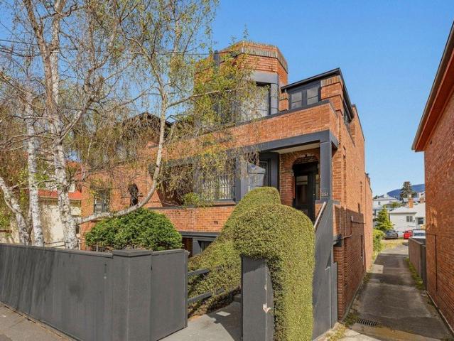 A Unique Dual Residence Opportunity in Central Sandy Bay, Built to Last