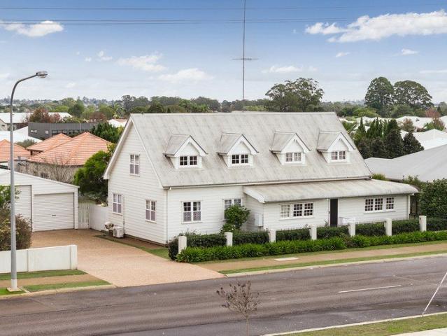 A Unique Farmhouse Style Home on 1,518m² with Outstanding Shed Space and Potential