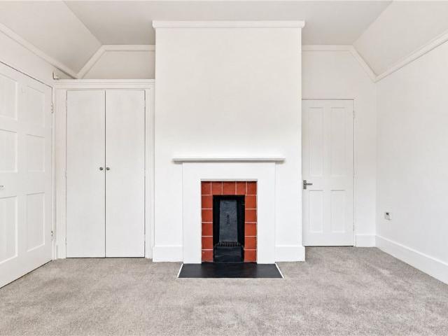 A unique four bedroom Tudor revival style cottage designed by William Butterfield and dating back to 1893, situated at the gate lodges at the entrance drive to Fulham Palace. EPC rating D