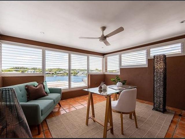 A UNIQUE HOME WITH STUNNING WIDE WATERS VIEWS