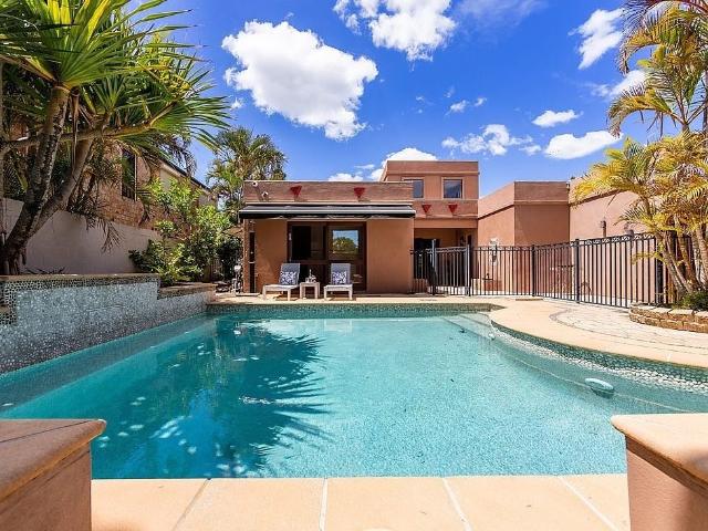 A UNIQUE HOME WITH STUNNING WIDE WATERS VIEWS