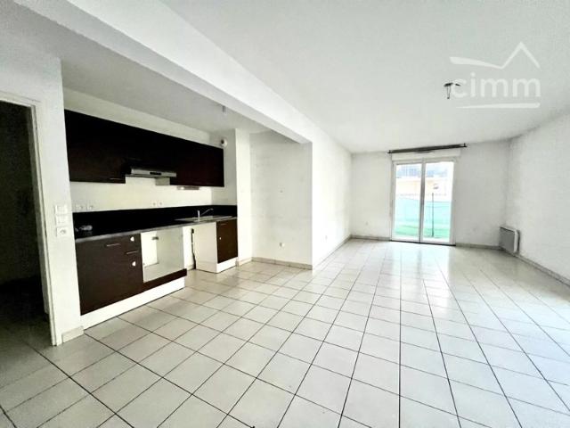 À vendre: appartement F3 en rez de jardin