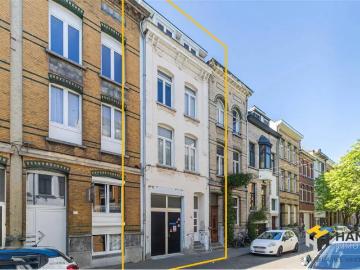 Geschakelde Woning te koop in Statiekwartier - Parkeerplaats