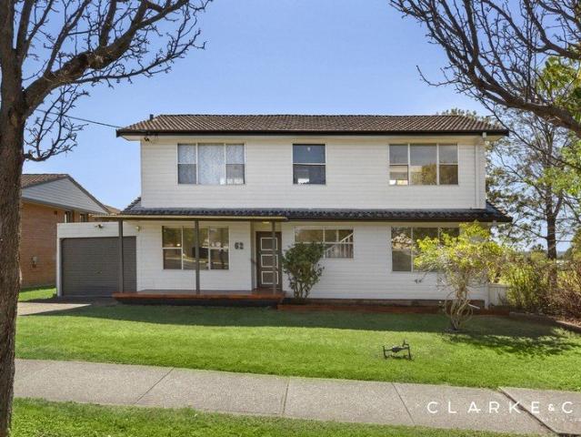 A VERSATILE TWO LEVEL FAMILY HOME!