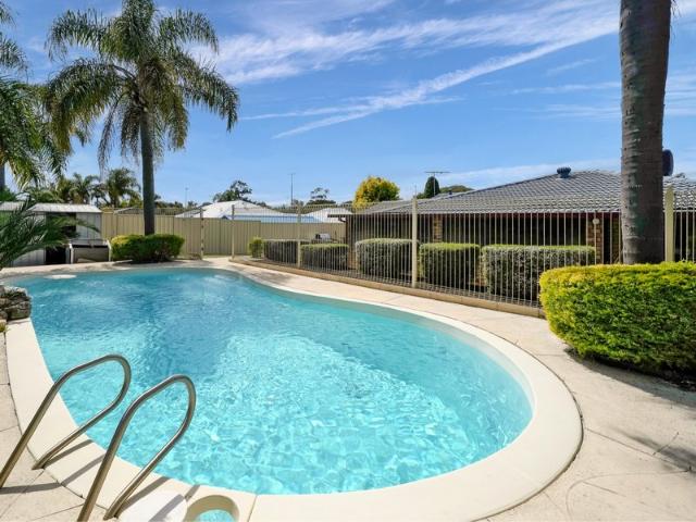 A Versatile Family Home with Pool, Multiple Living Areas & Entertaining Appeal