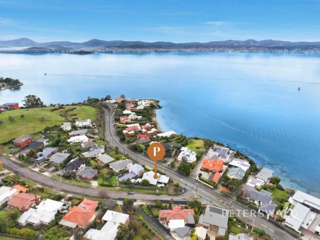 A Versatile Sandy Bay Opportunity with Water Views