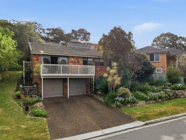 A Warm, Character Filled Lakeside Home with Cathedral Ceilings & Endless Flexibility