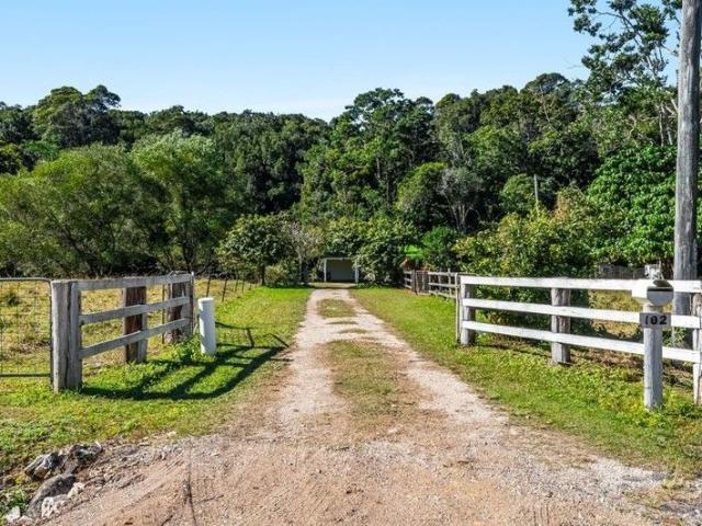 A Horse Ready 11.5 Acre Haven with Creek, Spring Fed Dam and a Charming Country Home