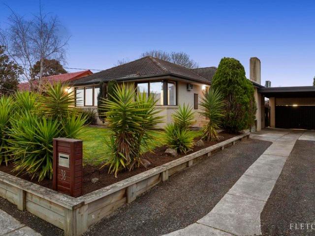 A Warm Family Haven with an Entertainer's Backyard