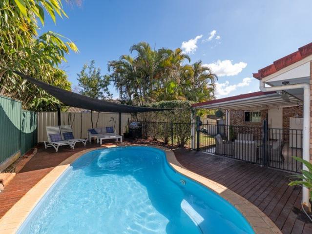 A Warm & Welcoming Family Home with Pool, Solar & More