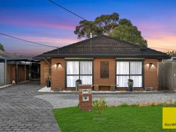 A Warm & Welcoming Home in a Highly Sought After Pocket