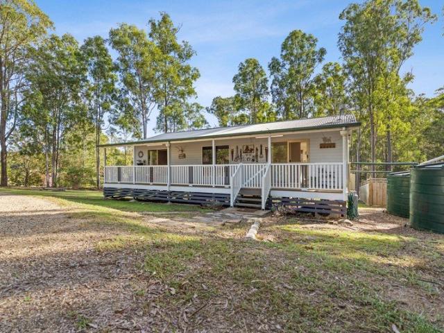 A Warm & Welcoming Home on a 2 Acre Parcel!