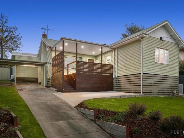 A Warm, Updated Home with a Backyard to Love