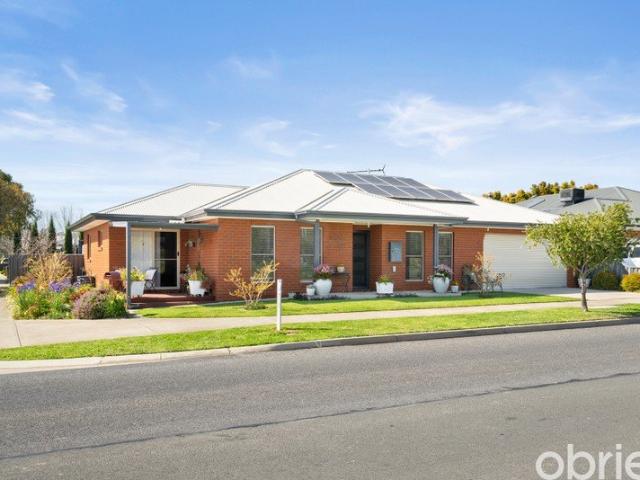 A Welcoming Home Surrounded by Established Gardens