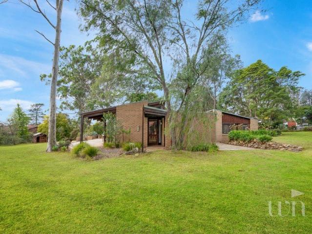 A Welcoming Retro Retreat with Endless Potential