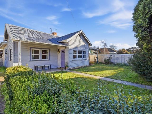 A WELL LOVED HOME WITH ENDLESS POTENTIAL