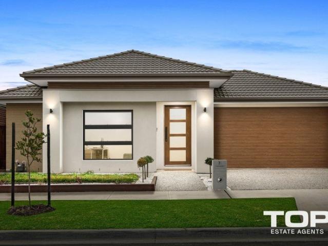A Well Located Custom Home Crafted for Modern Family Living